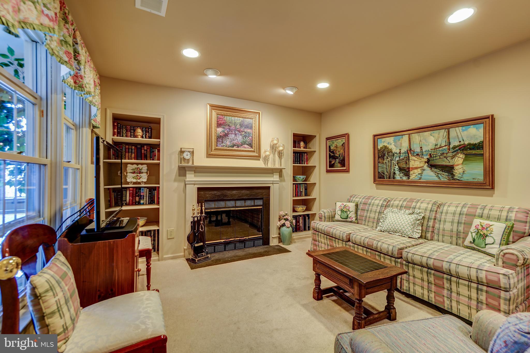 10706 Kings Riding Way, Unit 20118 Rockville, MD 20852 - Photo 11 of 33 Enjoy the FP in the Den off Kitchen
