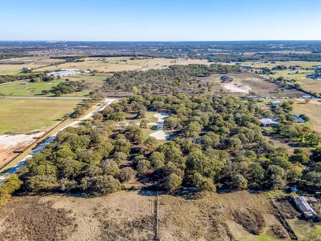 an aerial view of beach and ocean