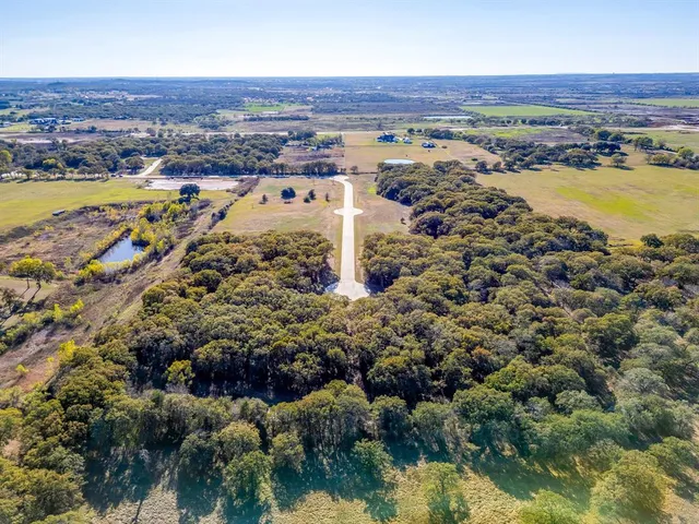 a view of swimming pool with a yard