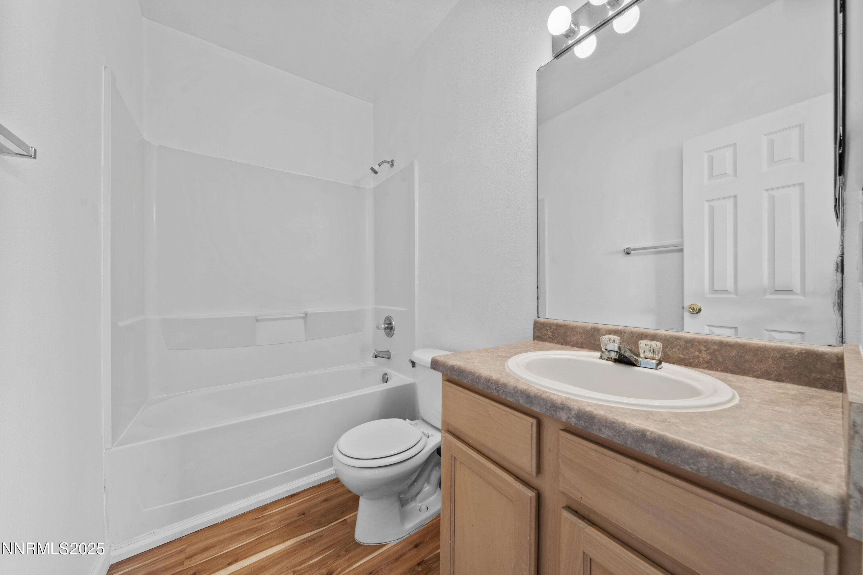 200 Talus Way, Unit 522 Reno, NV 89503 - Photo 18 of 40 a bathroom with a sink a toilet and shower