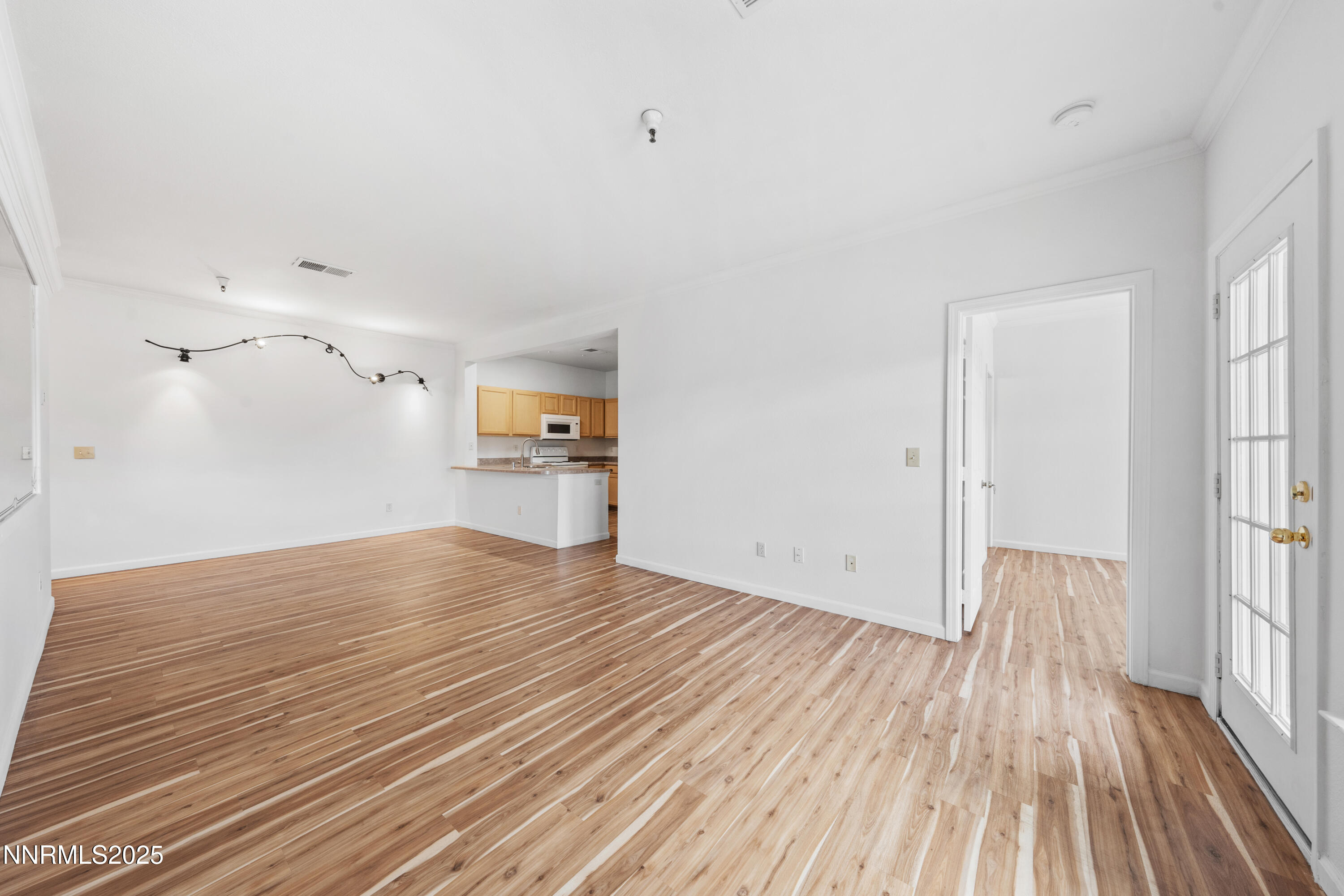 200 Talus Way, Unit 522 Reno, NV 89503 - Photo 19 of 40 a view of empty room with wooden floor