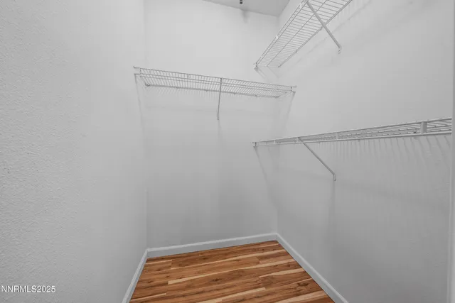 a view of a room with racks on the wall