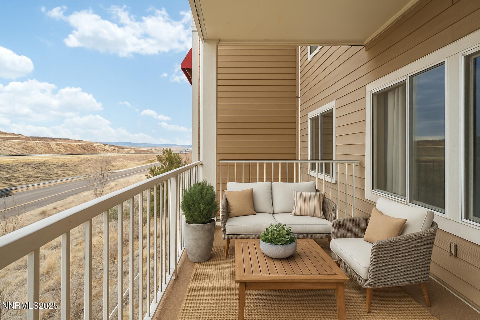 200 Talus Way, Unit 522 Reno, NV 89503 - Photo 36 of 40 a balcony with furniture and a potted plant