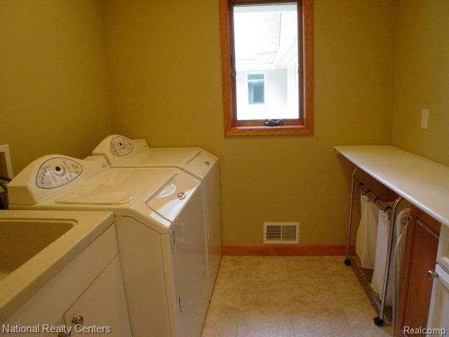 8750 Tipsico Lake Road Holly, MI 48442 - Photo 11 of 25 Laundry Center