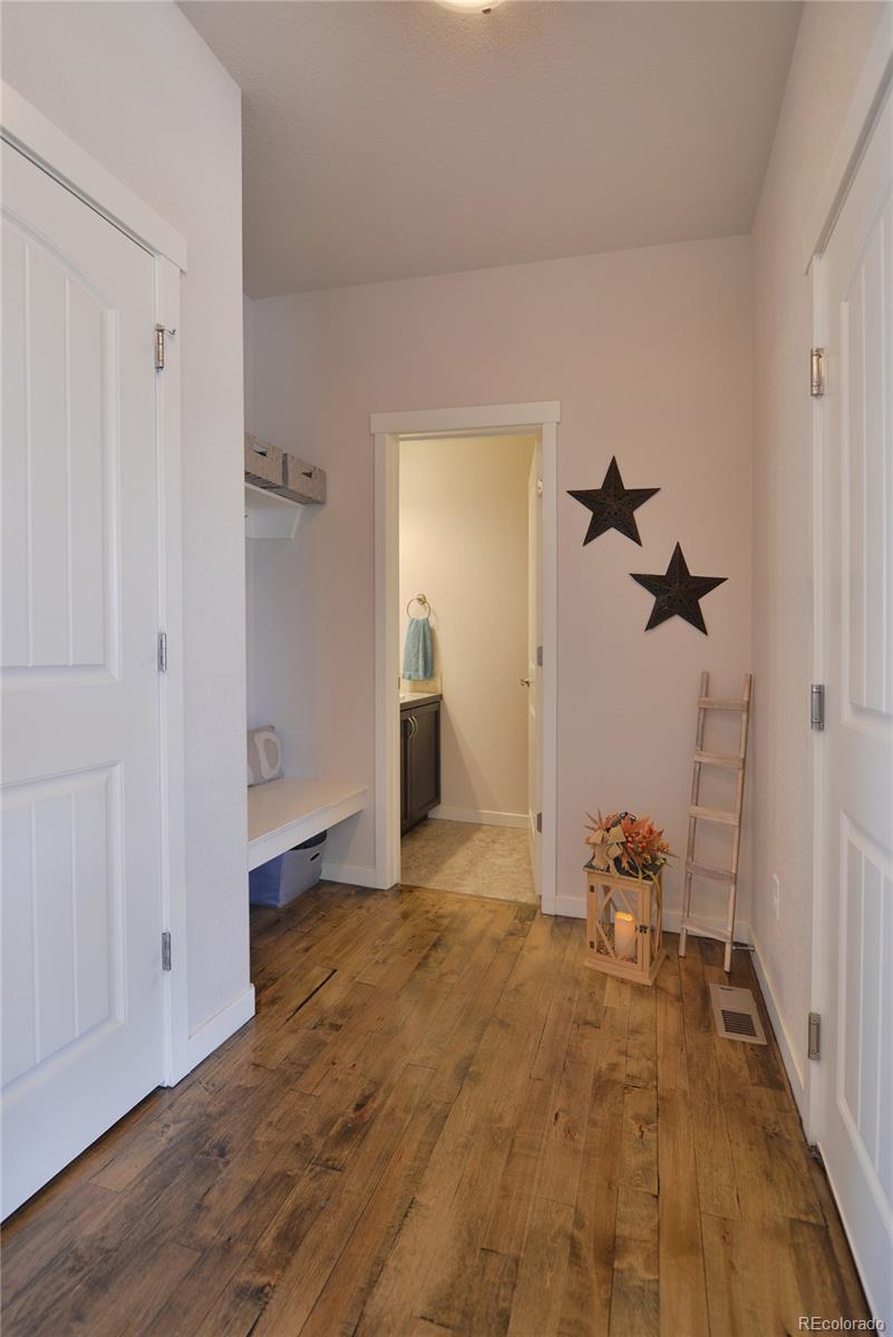 1643 Alpine Avenue Berthoud, CO 80513 - Photo 28 of 40 a view of a room with a hardwood floor