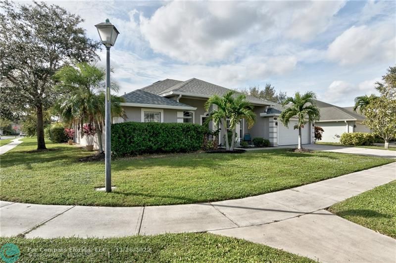 132 Drake Way Sebastian, FL 32958 - Photo 1 of 37 a front view of a house with a yard