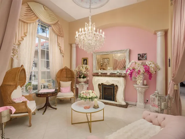 a reading room with furniture and book shelf