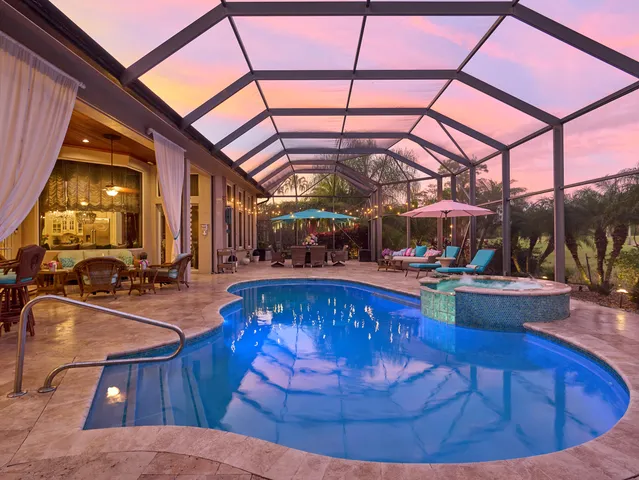 a view of swimming pool with patio