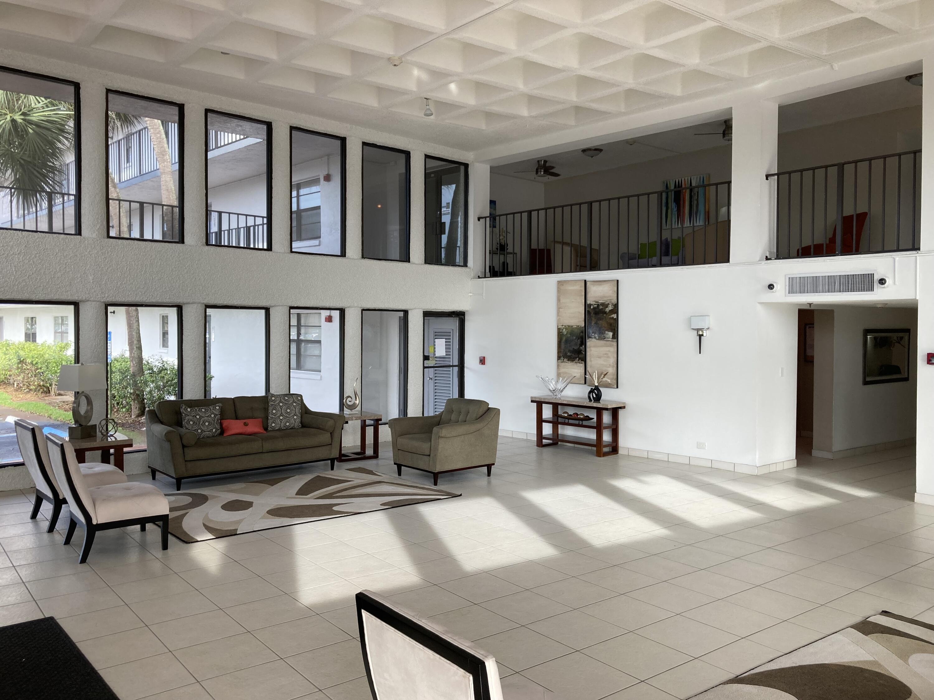 9233 Southwest 8th Street, Unit 305 Boca Raton, FL 33428 - Photo 38 of 48 9233 Newly Painted Lobby