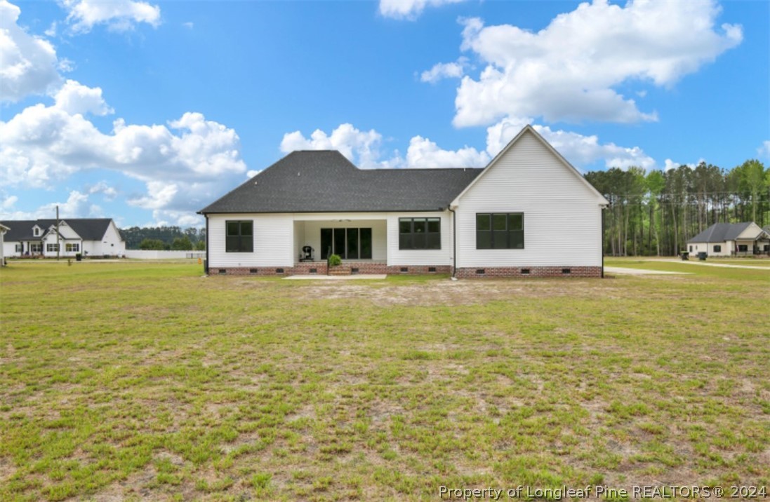 5621 Toby Pl Road Stedman, NC 28391 - Photo 35 of 38 a front view of a house with a yard