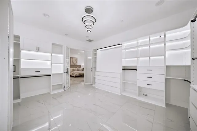 a bathroom with a double vanity sink and mirror