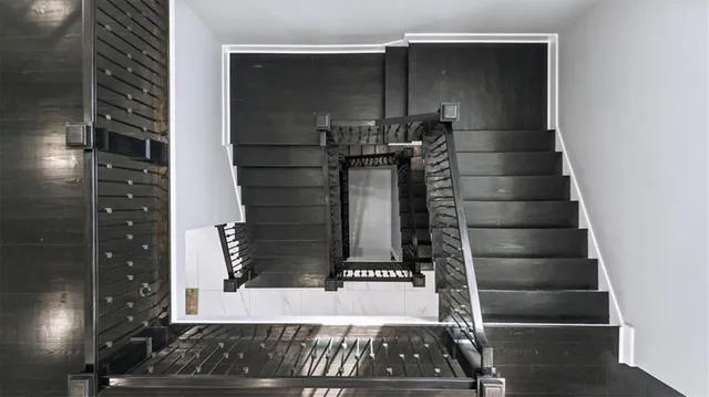 a bathroom with a toilet sink and tub