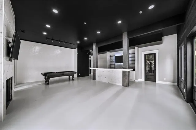 an aerial view of a house with outdoor space