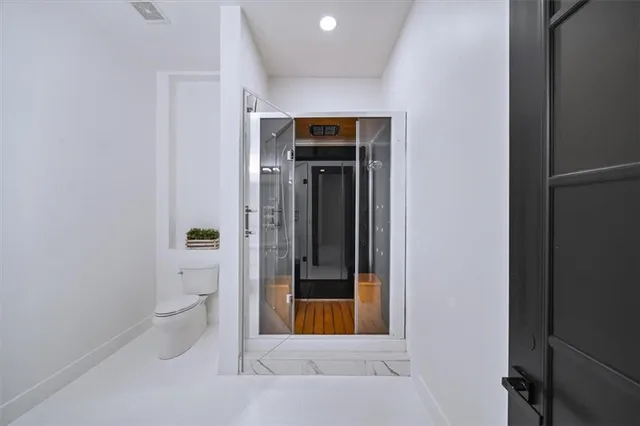 a outdoor living space with patio furniture and a wooden floor