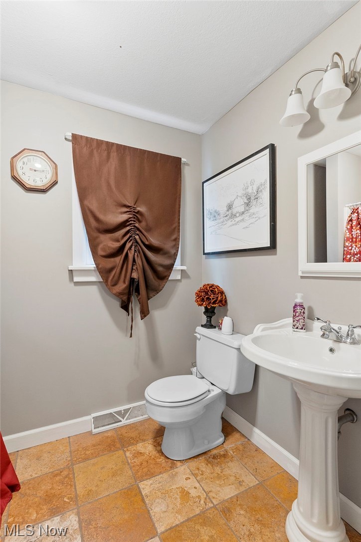 4275 West Calla Road Canfield, OH 44406 - Photo 26 of 31 Bathroom with toilet and tile floors