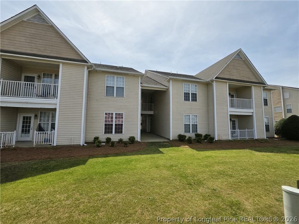 1324 Kershaw Loop, Unit 206 Fayetteville, NC 28314 - Photo 26 of 26 a front view of house with yard and green space