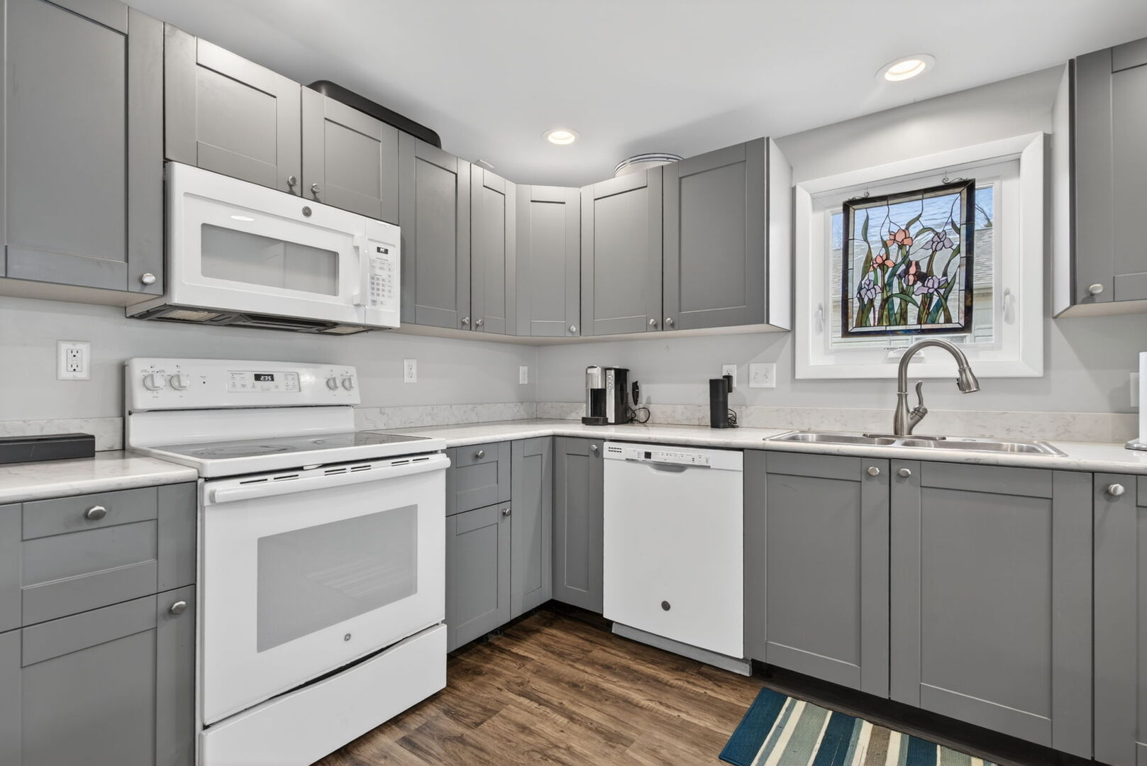 18530 West 3000 N Road, Unit 173 173 Reddick, IL 60961 - Photo 15 of 39 a kitchen with appliances cabinets and a sink