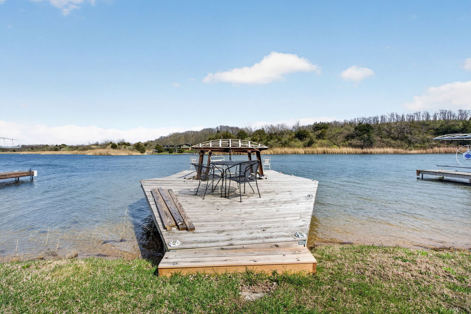 18530 West 3000 N Road, Unit 173 173 Reddick, IL 60961 - Photo 25 of 39 a view of a lake with couches in front of house