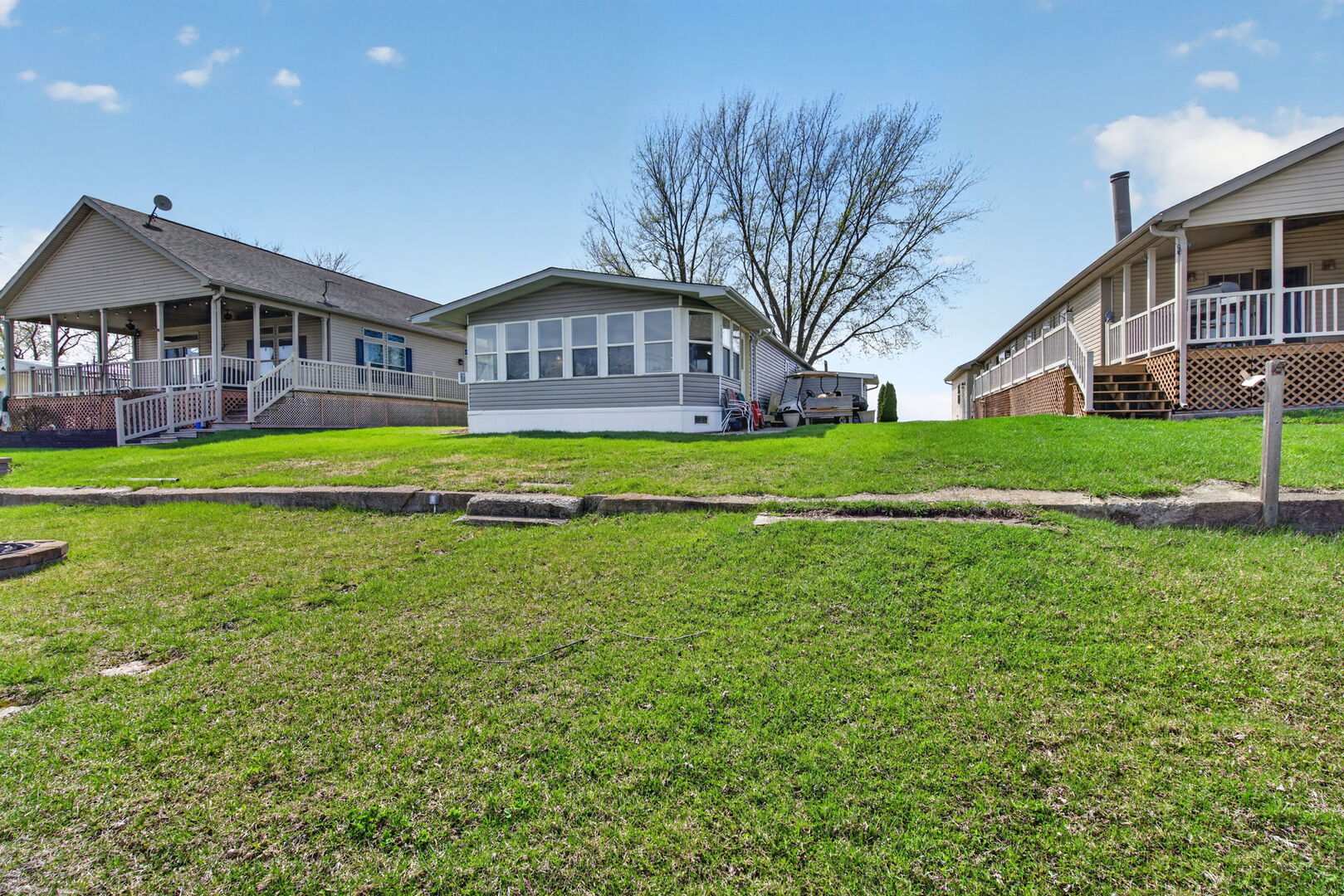 18530 West 3000 N Road, Unit 173 173 Reddick, IL 60961 - Photo 28 of 39 a front view of house with yard and green space