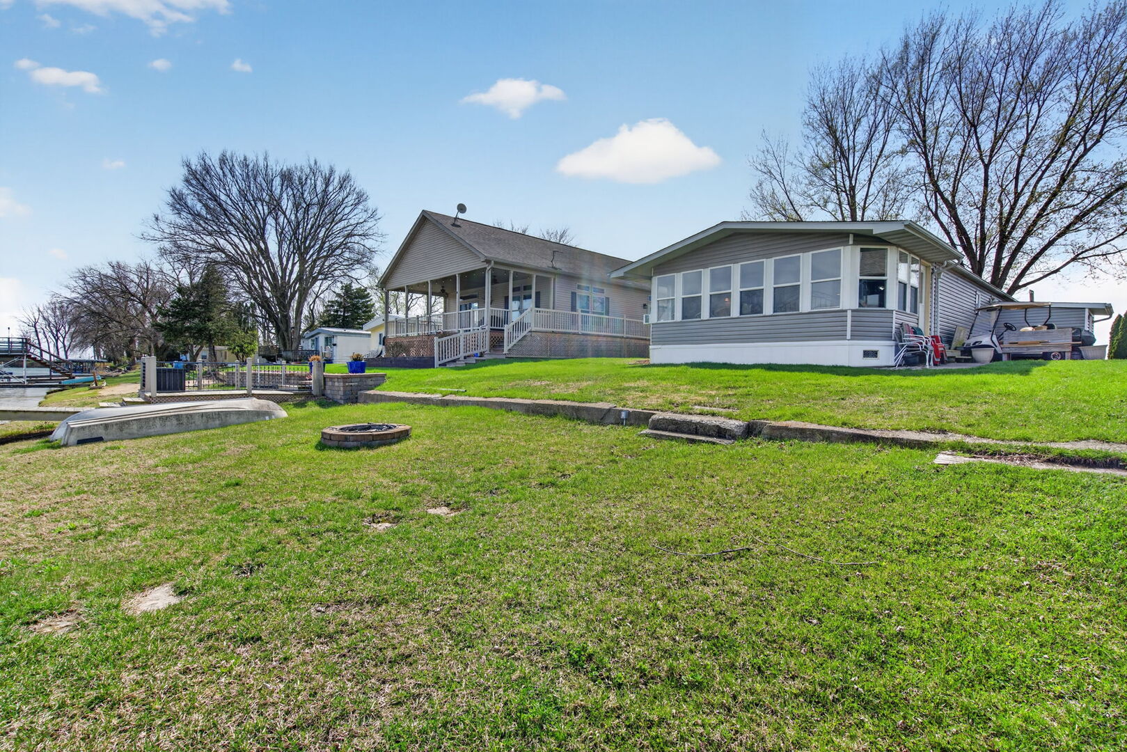 18530 West 3000 N Road, Unit 173 173 Reddick, IL 60961 - Photo 29 of 39 a front view of a house with garden