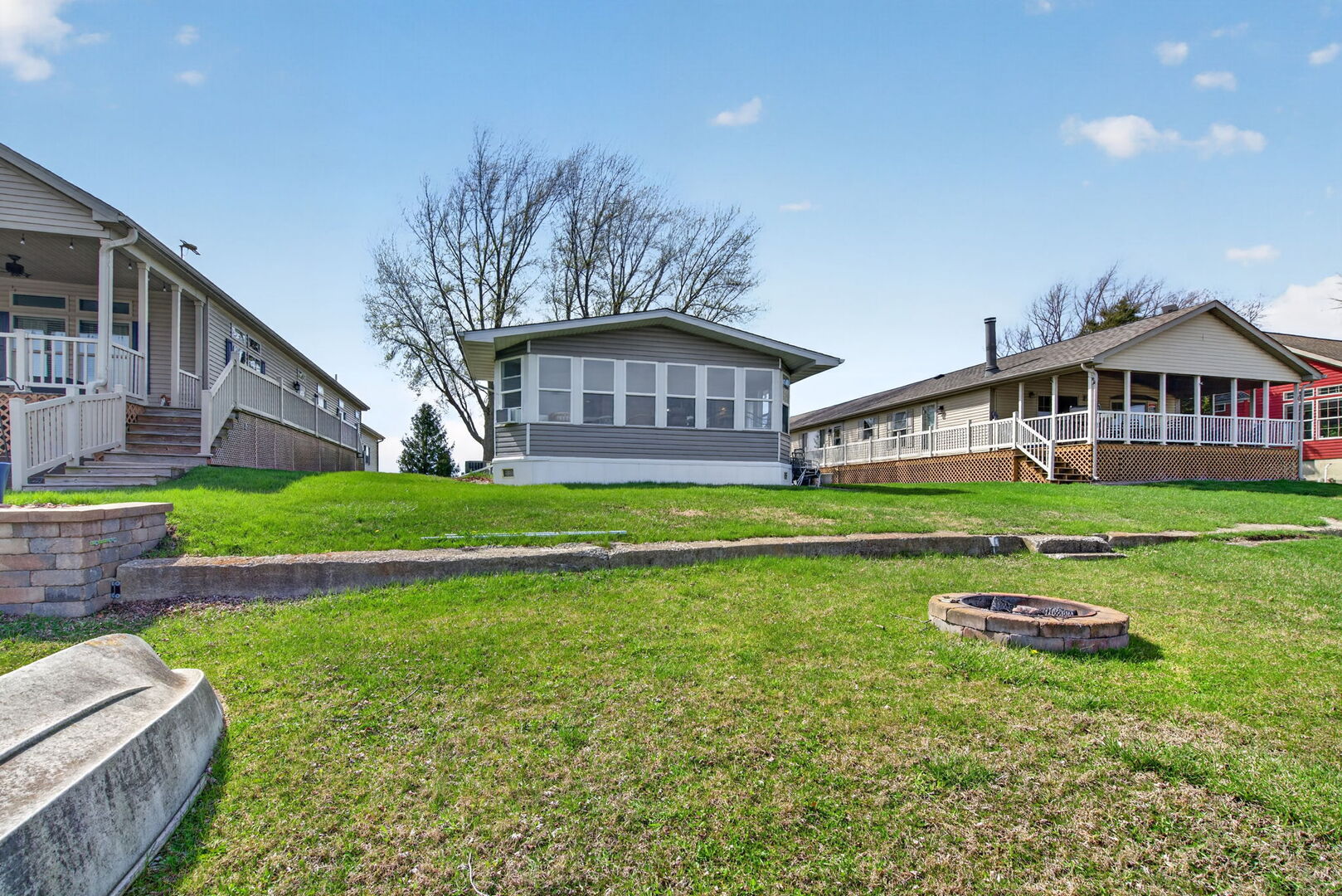 18530 West 3000 N Road, Unit 173 173 Reddick, IL 60961 - Photo 32 of 39 a front view of a house with a yard