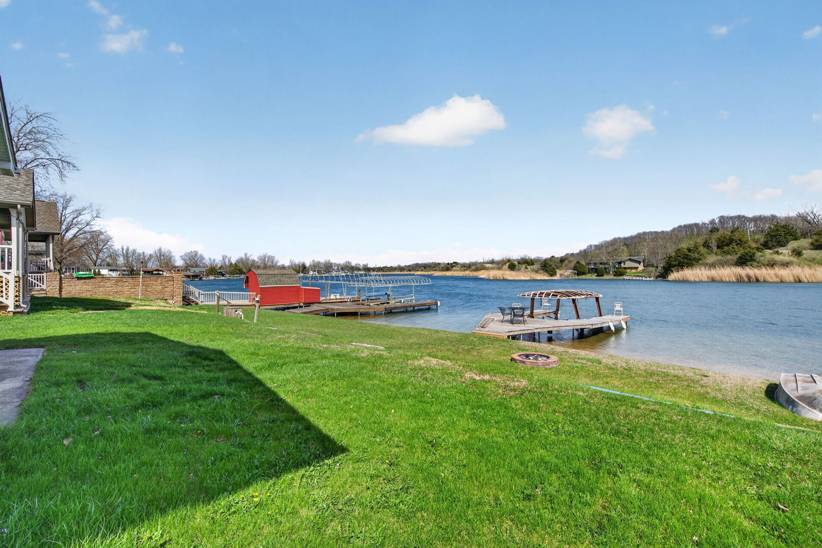 18530 West 3000 N Road, Unit 173 173 Reddick, IL 60961 - Photo 33 of 39 a view of a lake with houses in the back