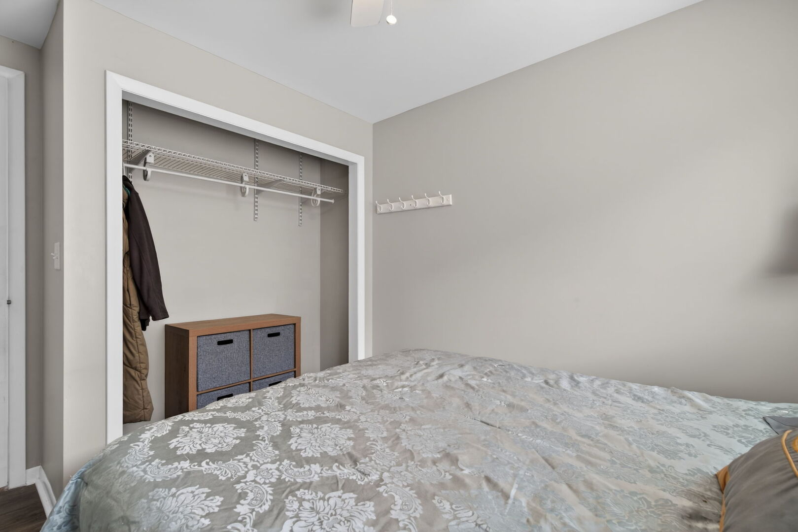 18530 West 3000 N Road, Unit 173 173 Reddick, IL 60961 - Photo 7 of 39 a bedroom with a bed and a dresser