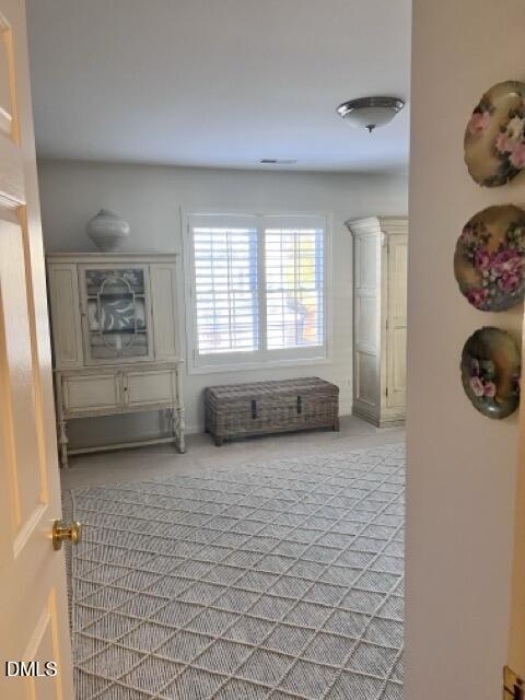 7601 Astoria Place Raleigh, NC 27612 - Photo 16 of 30 a view of an empty room and window