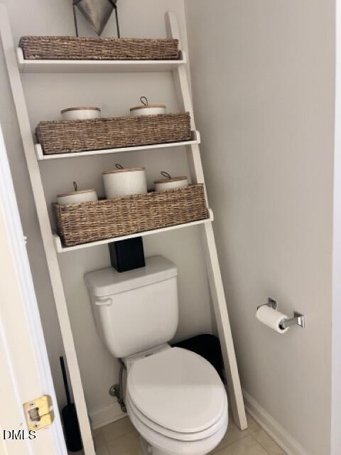 7601 Astoria Place Raleigh, NC 27612 - Photo 19 of 30 a bathroom with a toilet and a sink