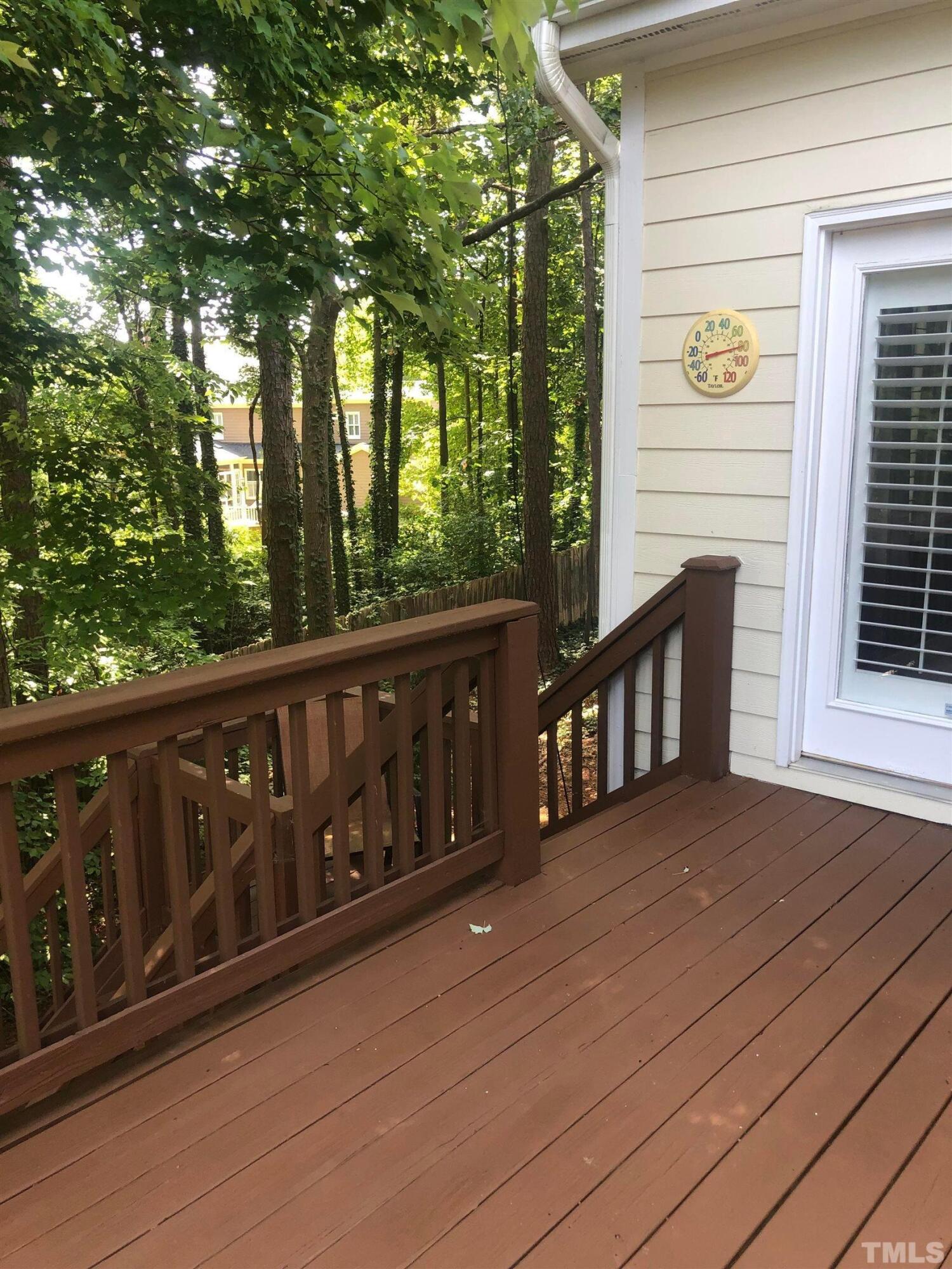 7601 Astoria Place Raleigh, NC 27612 - Photo 29 of 30 a view of a wooden deck