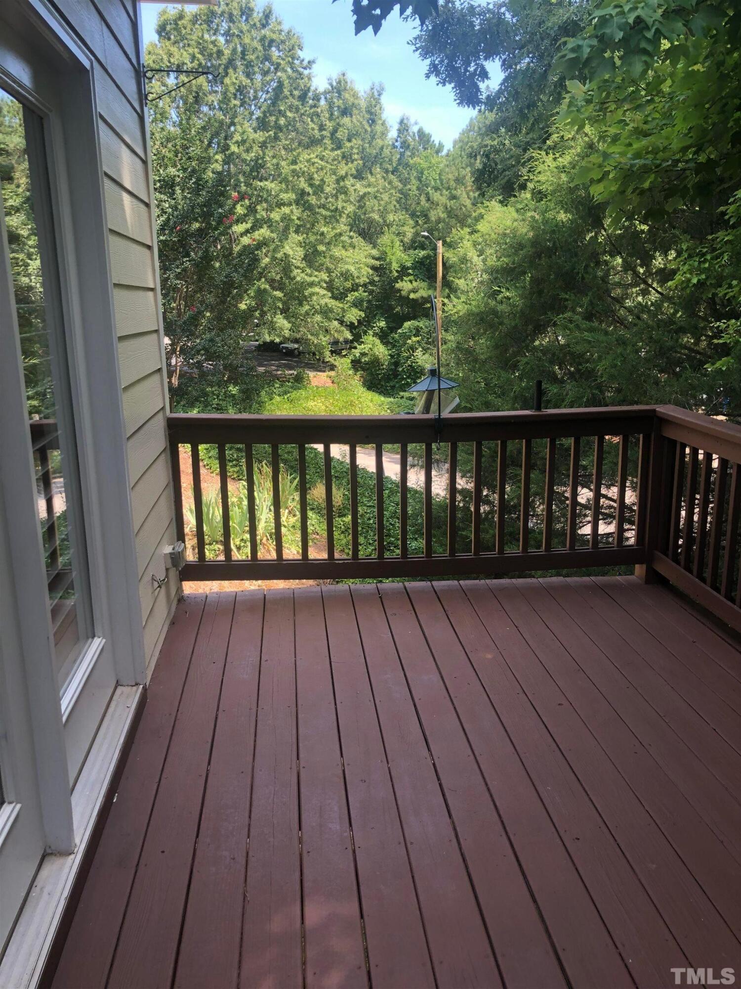 7601 Astoria Place Raleigh, NC 27612 - Photo 30 of 30 a view of balcony with wooden floor