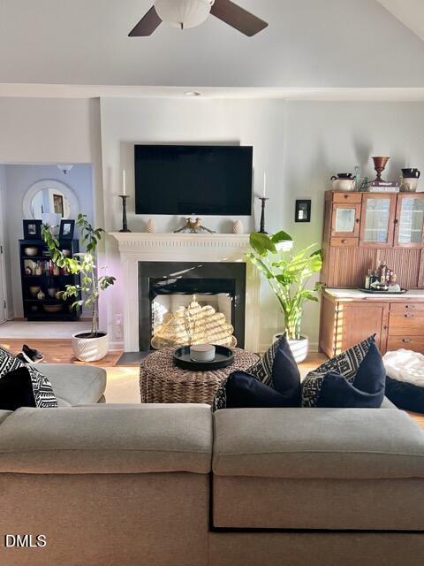 7601 Astoria Place Raleigh, NC 27612 - Photo 3 of 30 a living room with furniture and a fireplace