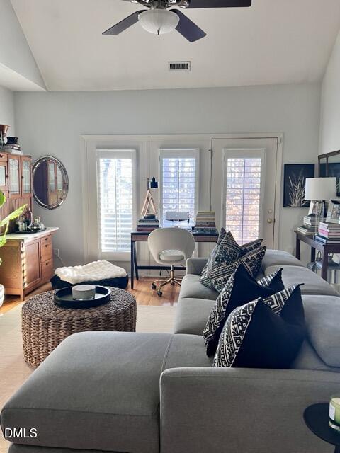 7601 Astoria Place Raleigh, NC 27612 - Photo 4 of 30 a living room with furniture and a window