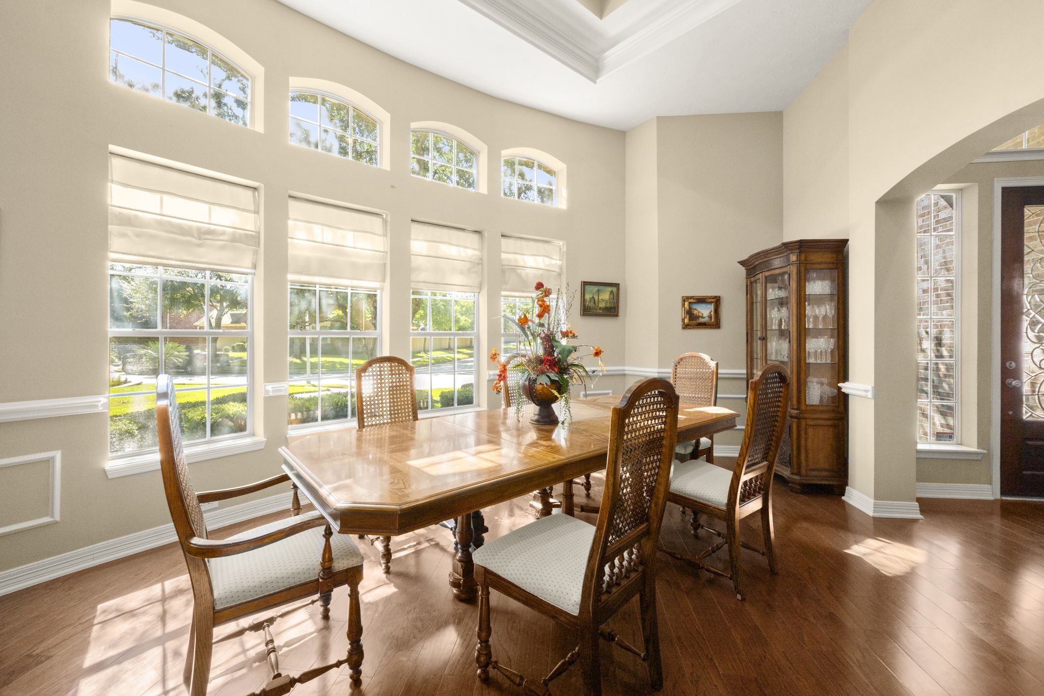19902 Tidy Tips Lane Spring, TX 77379 - Photo 11 of 49 a dining room with furniture and wooden floor