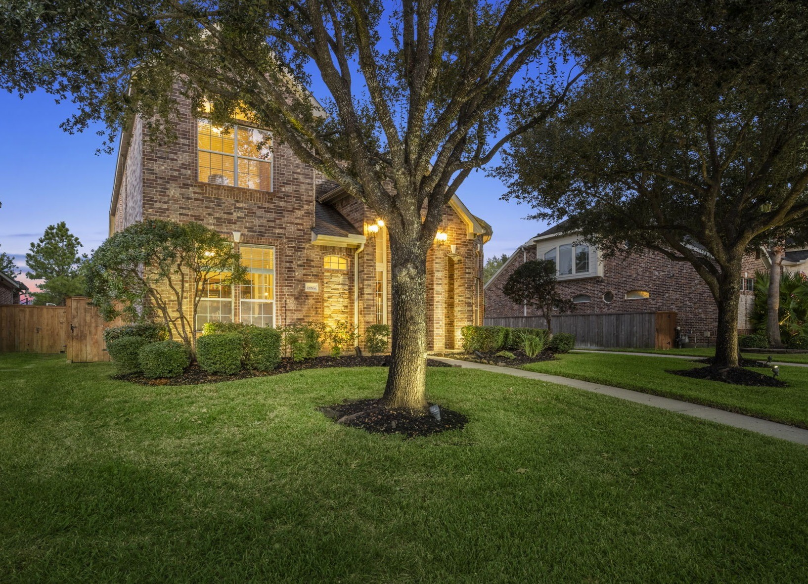 19902 Tidy Tips Lane Spring, TX 77379 - Photo 2 of 49 a view of a garden with a tree