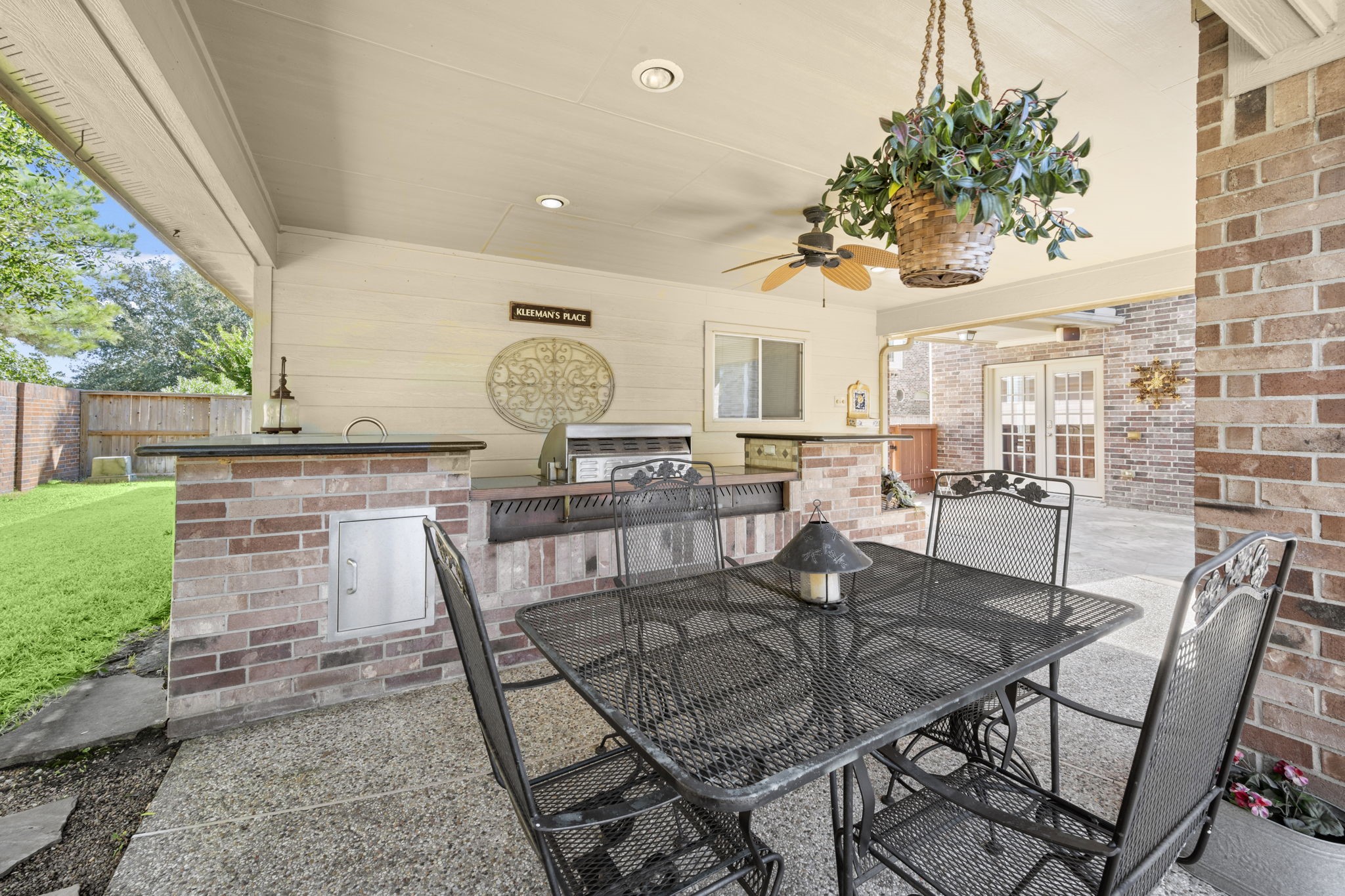 19902 Tidy Tips Lane Spring, TX 77379 - Photo 28 of 49 a view of a patio with table and chairs with wooden floor and fence