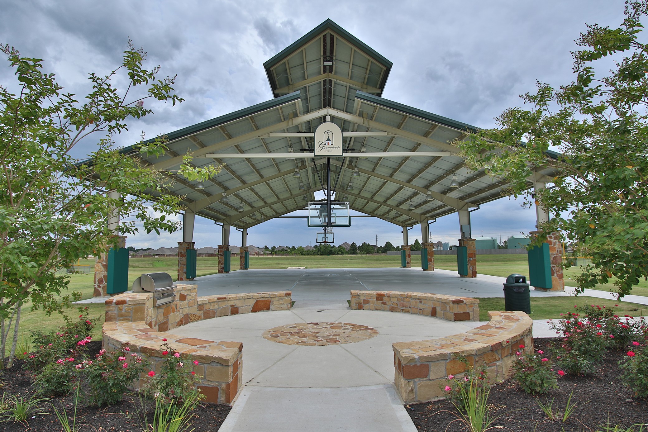 19902 Tidy Tips Lane Spring, TX 77379 - Photo 47 of 49 a view of a patio with a table and chairs under an umbrella