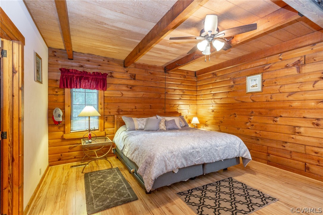 9901 Millers Run Road Chesterfield, VA 23236 - Photo 23 of 44 a bedroom with a bed and a night stand