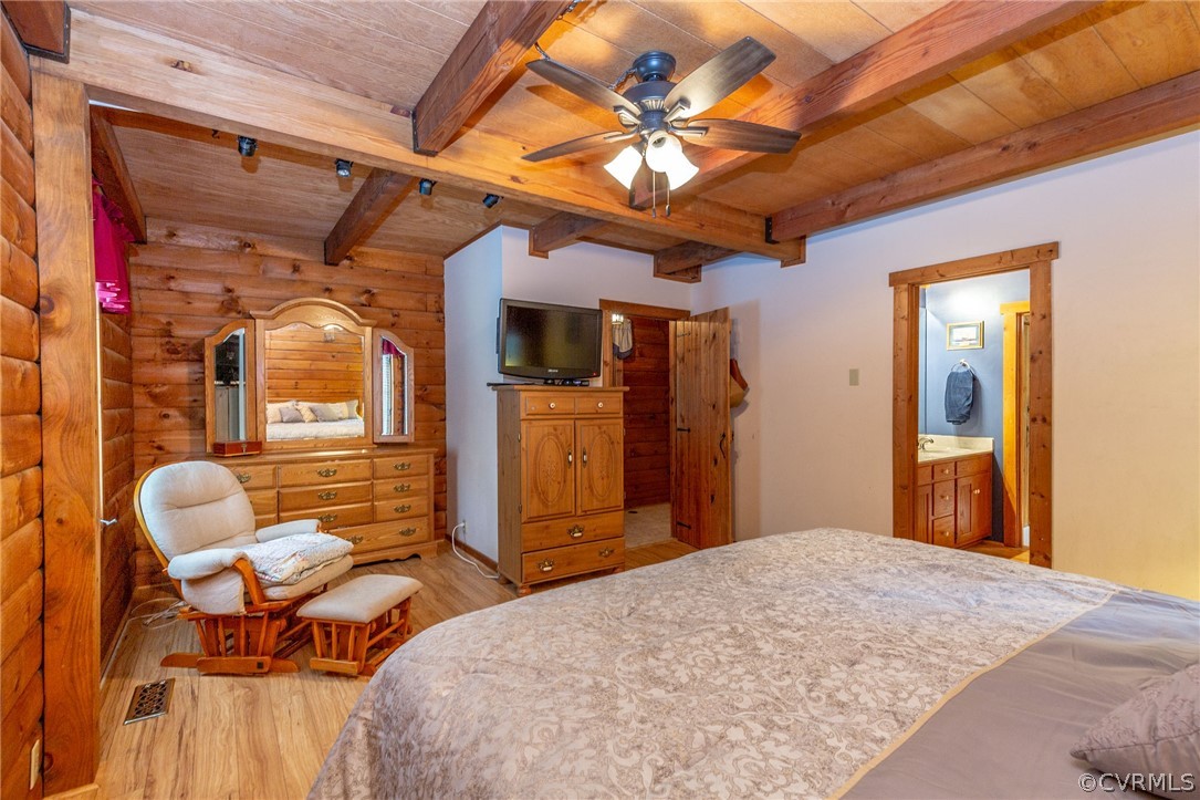 9901 Millers Run Road Chesterfield, VA 23236 - Photo 24 of 44 a bedroom with bed and wooden floor