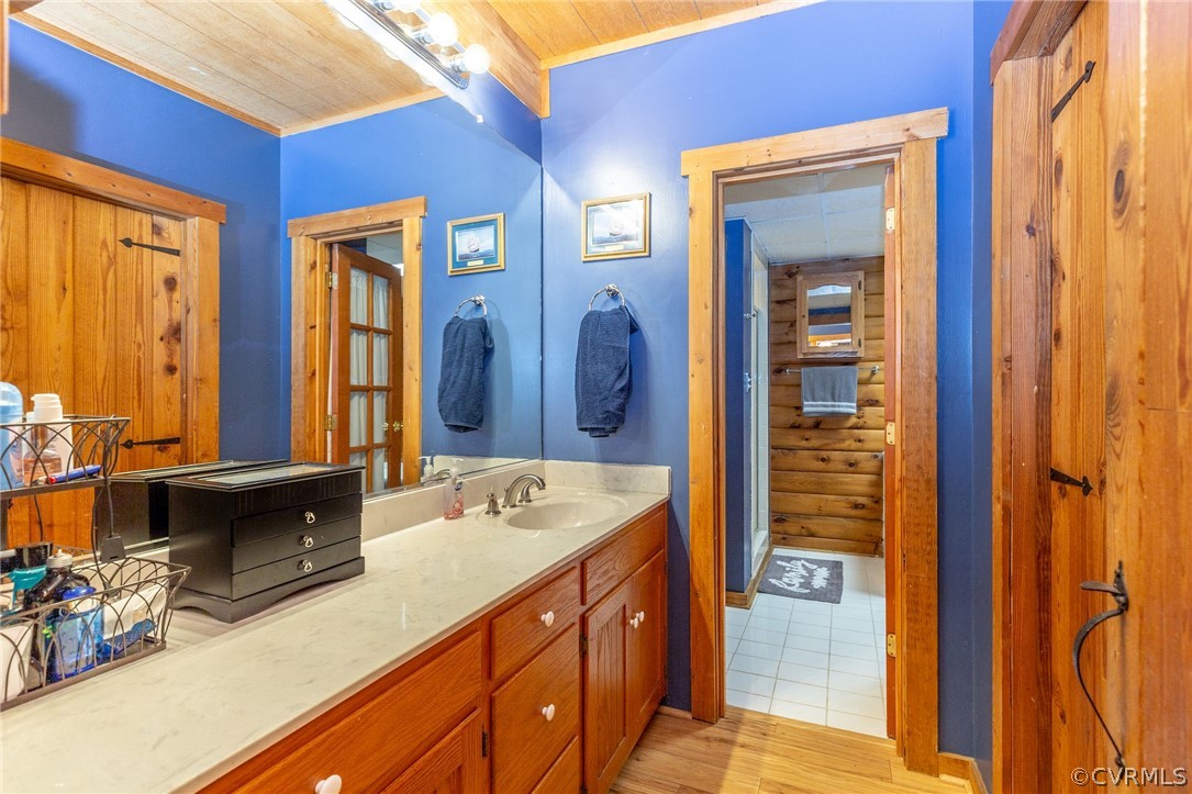 9901 Millers Run Road Chesterfield, VA 23236 - Photo 25 of 44 a bathroom with a sink and a mirror