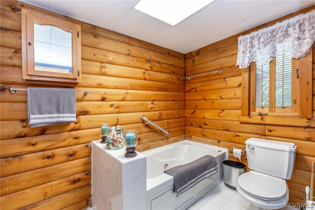 9901 Millers Run Road Chesterfield, VA 23236 - Photo 26 of 44 a bathroom with a sink and bathtub