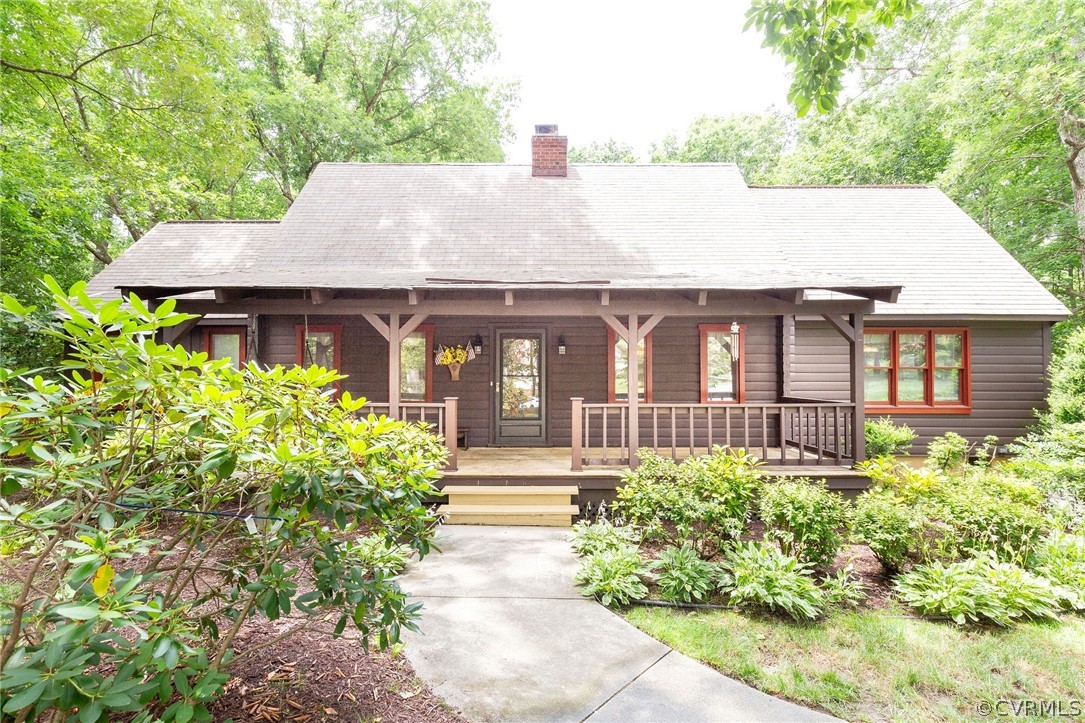 9901 Millers Run Road Chesterfield, VA 23236 - Photo 3 of 44 a front view of a house with garden