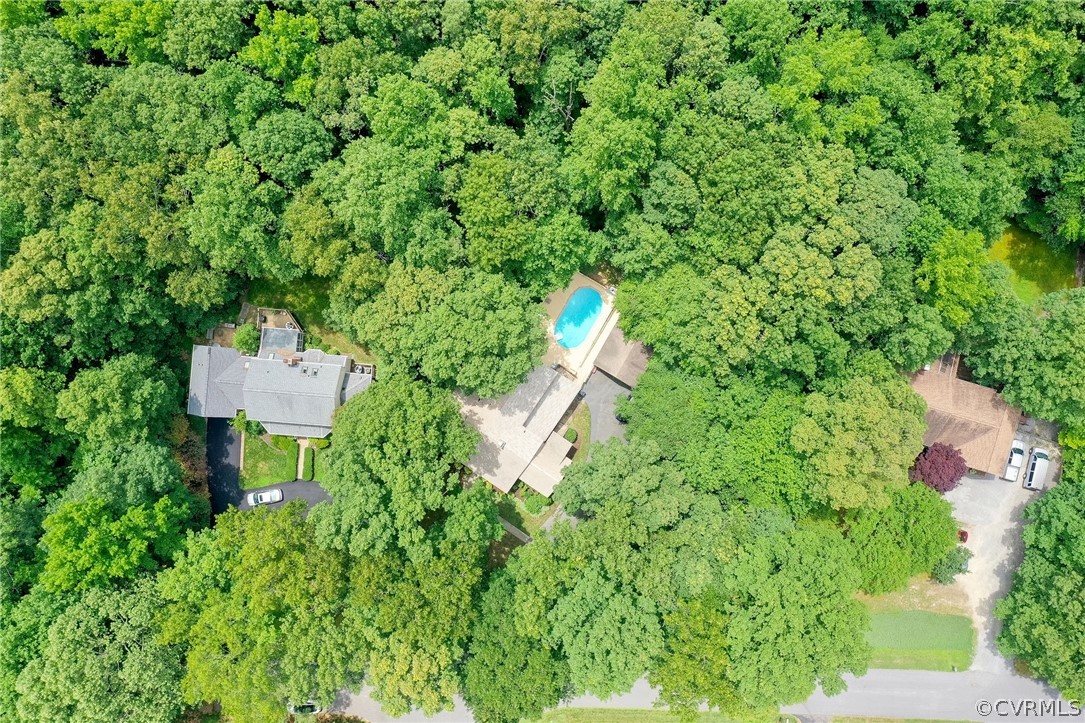 9901 Millers Run Road Chesterfield, VA 23236 - Photo 4 of 44 a backyard of a house with a yard and outdoor seating