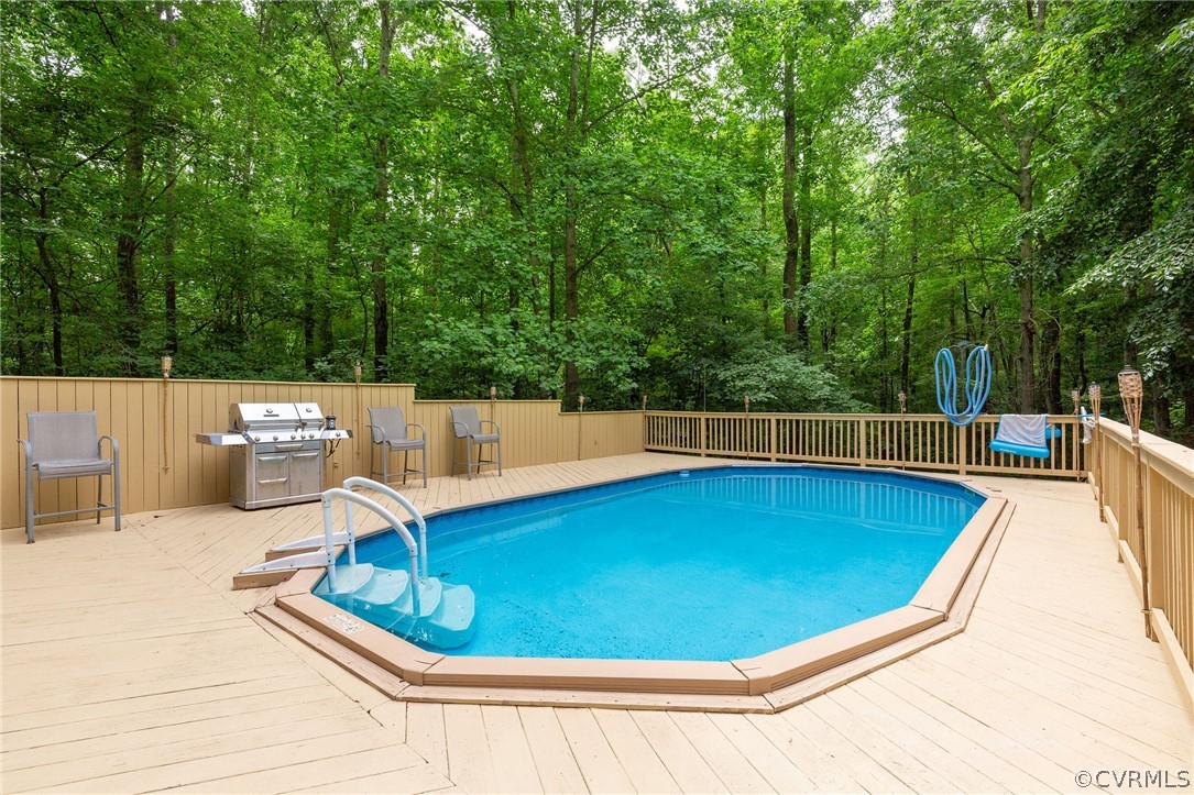 9901 Millers Run Road Chesterfield, VA 23236 - Photo 41 of 44 a view of a swimming pool with a patio