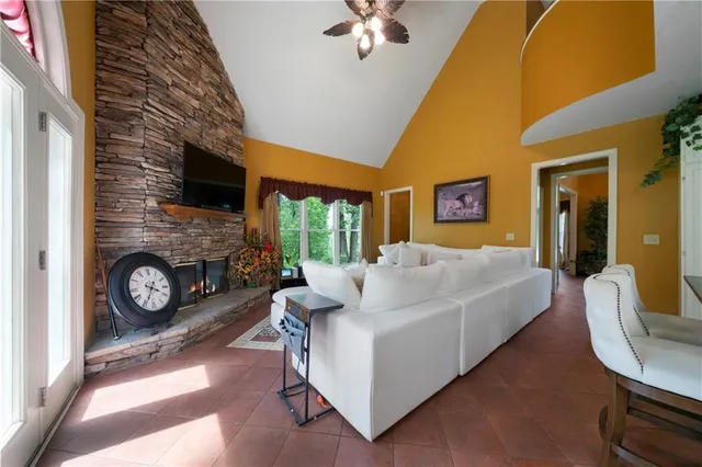 a bed room with a bed and a chair