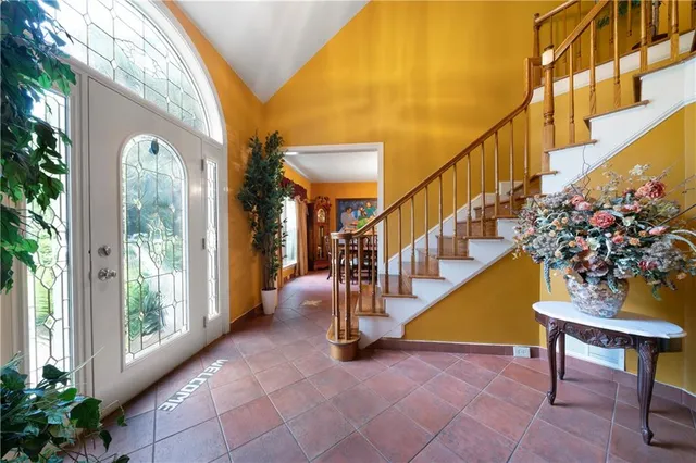 a view of entryway livingroom and hall