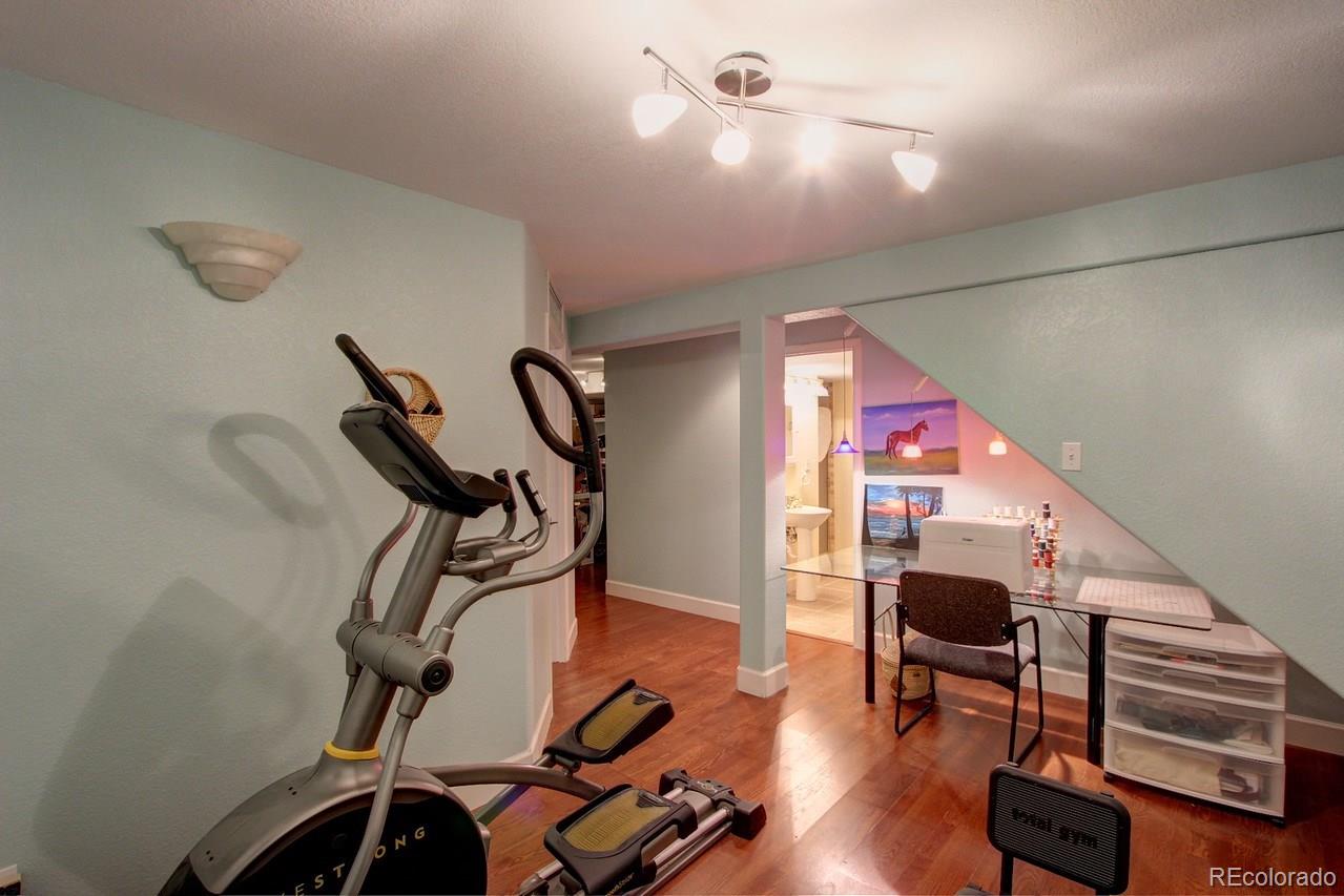 805 Nelson Park Drive Longmont, CO 80503 - Photo 26 of 33 a view of a room with gym equipment