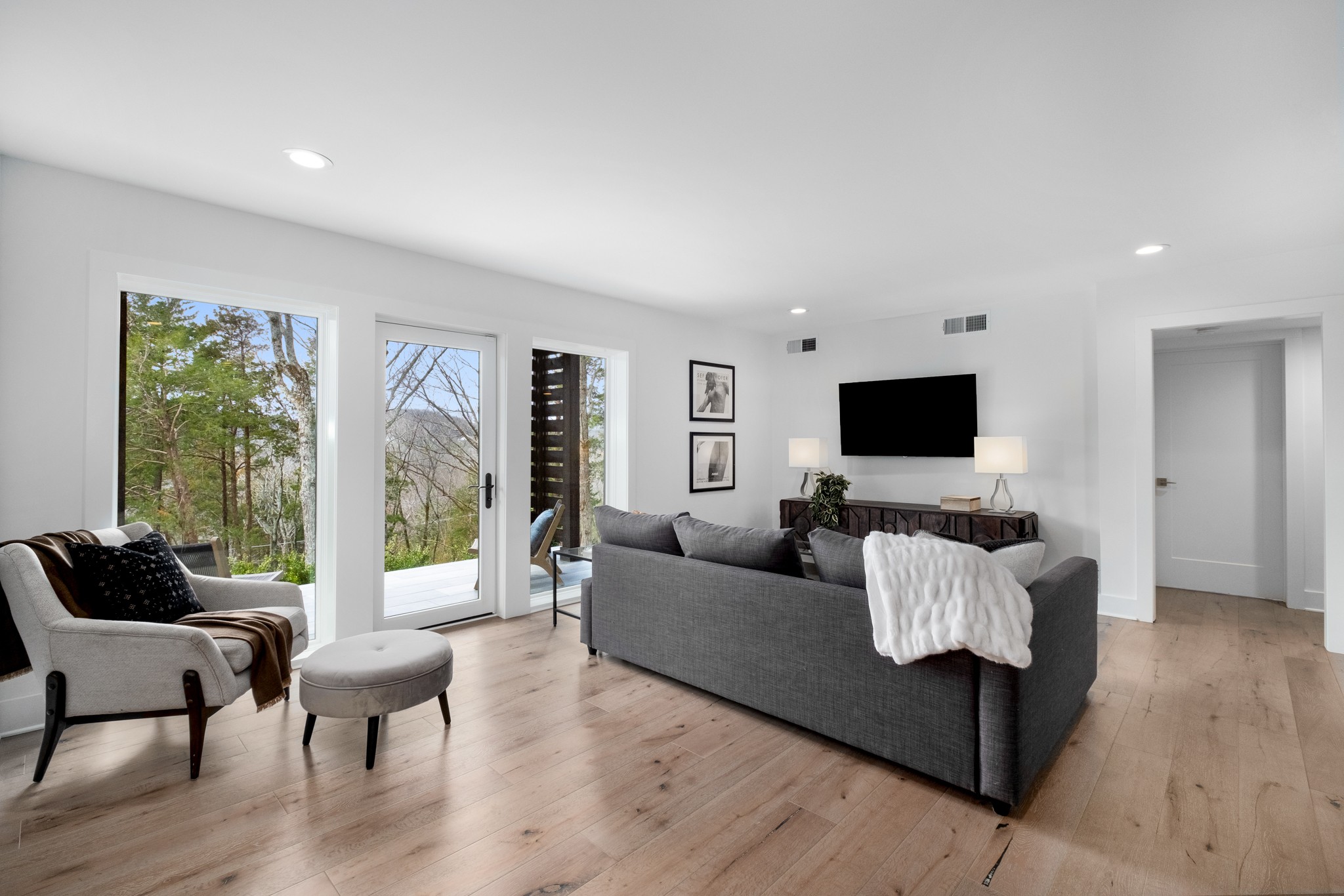 4628 Shys Hill Road Nashville, TN 37215 - Photo 12 of 42 a living room with furniture and a flat screen tv