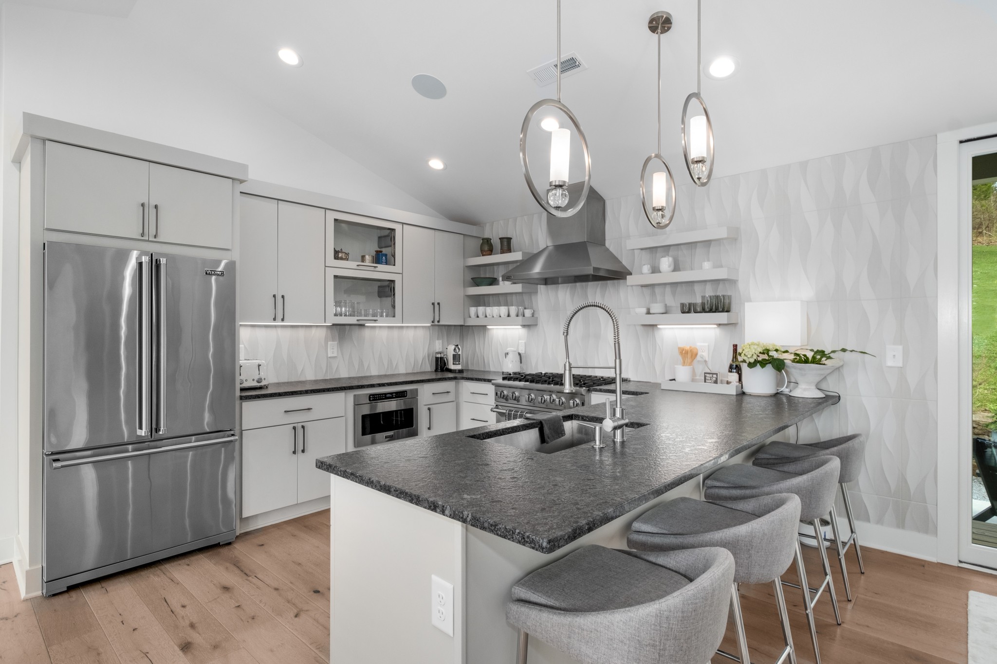 4628 Shys Hill Road Nashville, TN 37215 - Photo 16 of 42 a kitchen with stainless steel appliances granite countertop a sink a stove and refrigerator