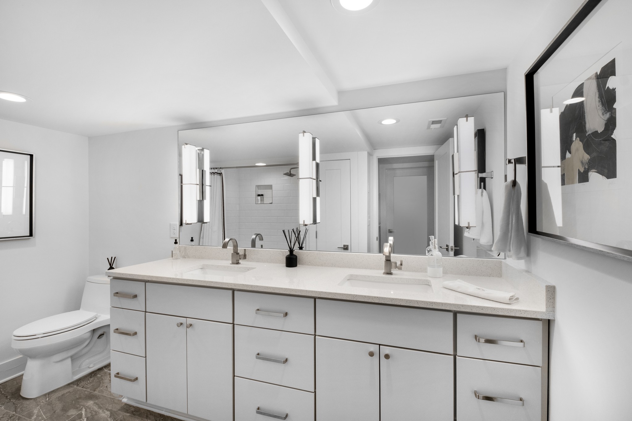 4628 Shys Hill Road Nashville, TN 37215 - Photo 26 of 42 a bathroom with a toilet sink and mirror